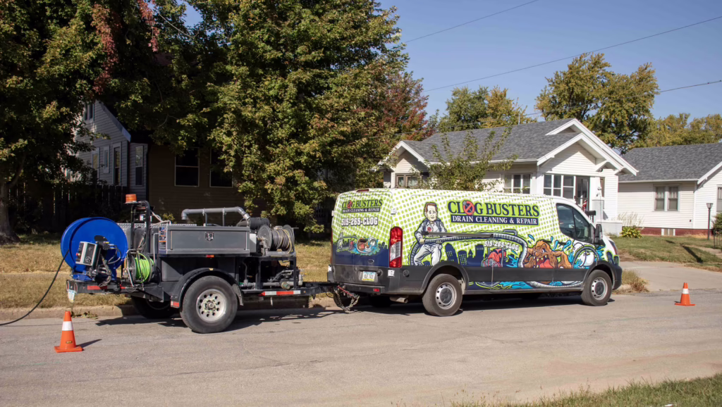 Clog Busters hydro jetter trailer cleaning a residential sewer line
